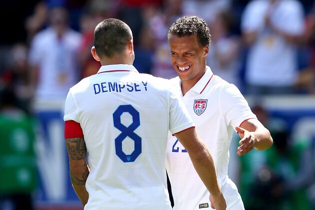 HARRISON, NJ - JUNE 01:  Clint Dempsey #8 of the United States is congratulated by teammate Timmy Chandler #21 after Dempsey scored in the second half against Turkey during an international friendly match at Red Bull Arena on June 1, 2014 in Harrison, New Jersey.The United States defeated Turkey 2-1.  (Photo by Elsa/Getty Images)
