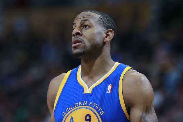 Golden State Warriors forward Andre Iguodala looks on against the Denver Nuggets in the fourth quarter of the Warriors' 89-81 victory in an NBA basketball game in Denver on Monday, Dec. 23, 2013. (AP Photo/David Zalubowski)