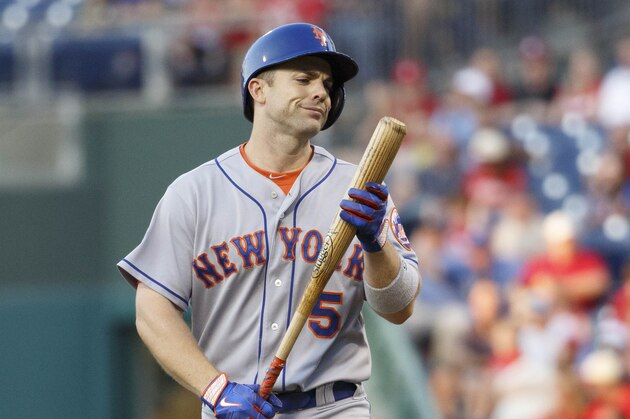 New York Mets' David Wright looks over his bat during a baseball game against the Philadelphia Phillies, Monday, June 2, 2014, in Philadelphia. The Mets won 11-2. (AP Photo/Chris Szagola)