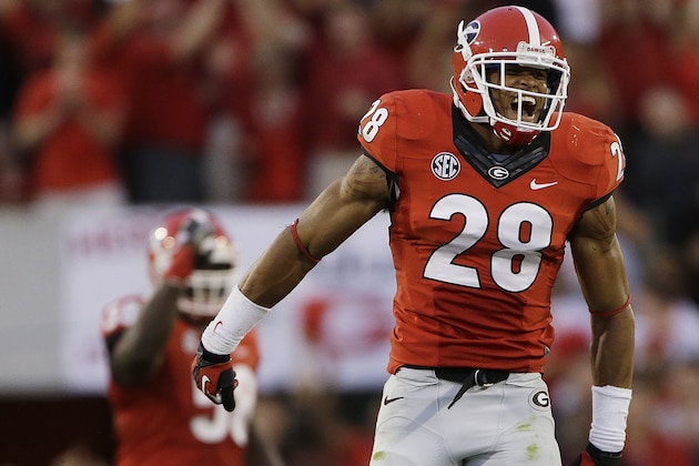 Georgia safety Tray Matthews (28) celebrates after their 44-41 win over LSU in an NCAA football game, Saturday, Sept. 28, 2013, in Athens, Ga. (AP Photo/John Bazemore)