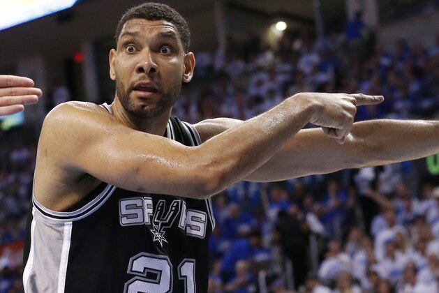 San Antonio Spurs forward Tim Duncan (21) gestures to an official in the third quarter of Game 4 of the Western Conference finals NBA basketball playoff series against the Oklahoma City Thunder in Oklahoma City, Tuesday, May 27, 2014.  (AP Photo/Sue Ogrocki)