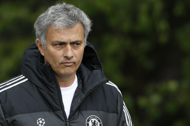 Chelsea manager Jose Mourinho arrives for a training session at Cobham in England, Tuesday, April 29, 2014. Chelsea will play a Champions League semifinal second leg soccer match against Atletico Madrid on Wednesday. (AP Photo/Kirsty Wigglesworth)