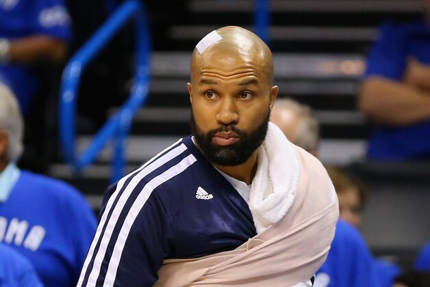 OKLAHOMA CITY, OK - MAY 25:  Derek Fisher #6 of the Oklahoma City Thunder looks on from the bench in the game against the San Antonio Spurs during Game Three of the Western Conference Finals of the 2014 NBA Playoffs at Chesapeake Energy Arena on May 25, 2014 in Oklahoma City, Oklahoma.  (Photo by Ronald Martinez/Getty Images)