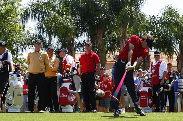 ORLANDO, FL - MARCH 25: Bubba Watson of the United States and Team Isleworth hits a drive as teammate Bo Van Pelt and Jay Haas and Fred Couples (L-R in yellow) of Team Primland look on during Day One of the Tavistock Cup held at Isleworth Golf and Country Club on March 25, 2013 in Orlando, Florida.  (Photo by Michael Cohen/Getty Images)