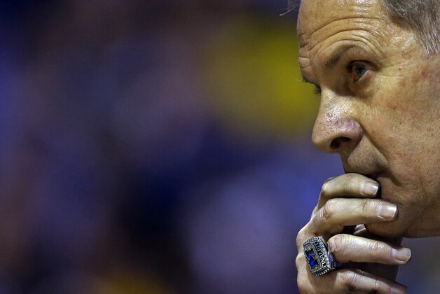 Michigan head coach John Beilein watches during the second half of an NCAA Midwest Regional final college basketball tournament game against Kentucky Sunday, March 30, 2014, in Indianapolis. (AP Photo/Michael Conroy)