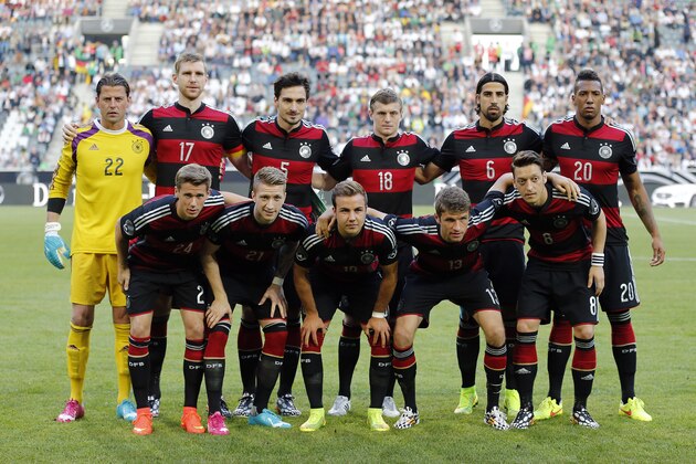 Team Germany poses for a group photo prior  a friendly WCup preparation soccer match between Germany and Cameroon in Moenchengladbach, Germany, Monday, June 2, 2014. (AP Photo/Frank Augstein)