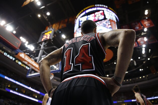 Chicago Bulls' D.J. Augustin in action during an NBA basketball game against the Philadelphia 76ers, Wednesday, March 19, 2014, in Philadelphia. (AP Photo/Matt Slocum)