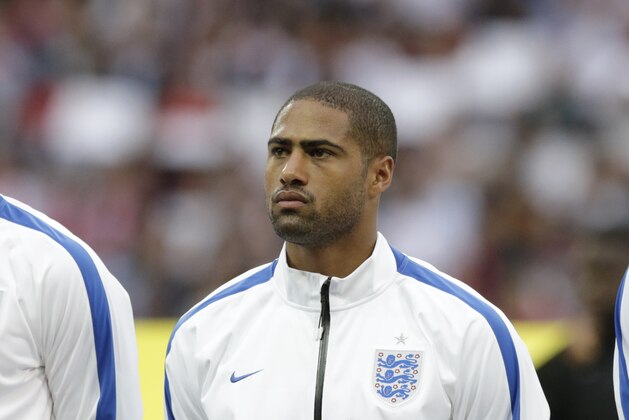 England's Glen Johnson stands in a team line up during the playing of the national anthems before the international friendly soccer match between England and Peru at Wembley Stadium in London, Friday, May 30, 2014. (AP Photo/Matt Dunham) England's Glen Johnson stands in a team line up during the playing of the national anthems before the international friendly soccer match between England and Peru at Wembley Stadium in London, Friday, May 30, 2014. (AP Photo/Matt Dunham)