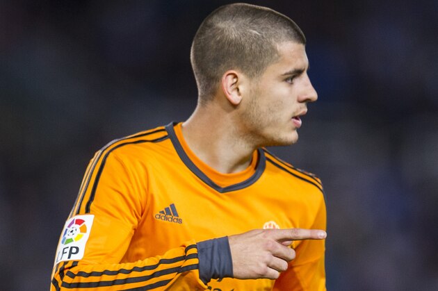 SAN SEBASTIAN, SPAIN - APRIL 05: Alvaro Morata of Real Madrid celebrates after scoring during the La Liga match between Real Sociedad and Real Madrid CF at Estadio Anoeta on April 5, 2014 in San Sebastian, Spain.  (Photo by Juan Manuel Serrano Arce/Getty Images)