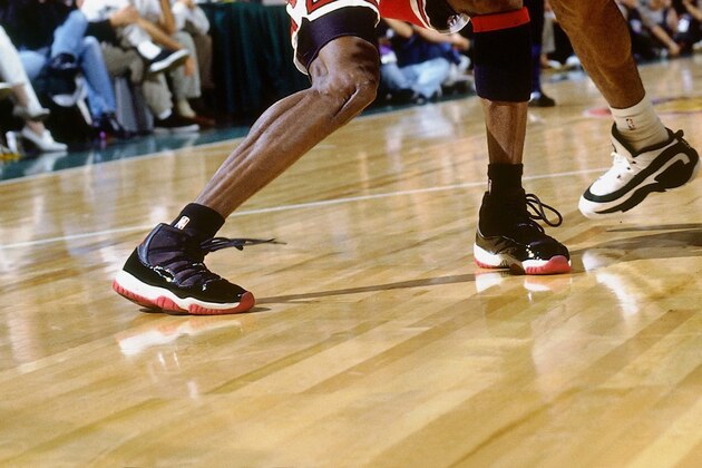 SEATTLE - JUNE 9:  Michael Jordan #23 of the Chicago Bulls makes a move against Hersey Hawkins #33 of the Seattle SuperSonics in Game Three of the 1996 NBA Finals at Key Arena on June 9, 1996 in Seattle, Washington. The Bulls won 108-86. NOTE TO USER: User expressly acknowledges that, by downloading and or using this photograph, User is consenting to the terms and conditions of the Getty Images License agreement. Mandatory Copyright Notice: Copyright 1996 NBAE (Photo by Andy Hayt/NBAE via Getty Images)