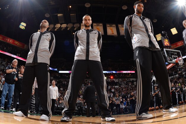 SAN ANTONIO, TX - MAY 21:  Tony Parker #9 Manu Ginobili #20 and Tim Duncan #21 of the San Antonio Spurs before the game against the Oklahoma City Thunder n Game Two of the Western Conference Finals during the 2014 NBA Playoffs on May 21, 2014 at the AT&T Center in San Antonio, Texas.  NOTE TO USER: User expressly acknowledges and agrees that, by downloading and or using this photograph, User is consenting to the terms and conditions of the Getty Images License Agreement. Mandatory Copyright Notice: Copyright 2014 NBAE  (Photo by Andrew D. Bernstein/NBAE via Getty Images)