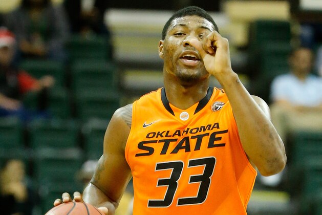 ORLANDO, FL - DECEMBER 01:  Marcus Smart #33 of the Oklahoma State Cowboys in action during the Old Spice Classic against the Memphis Tigers at HP Field House on December 1, 2013 in Orlando, Florida.  (Photo by Sam Greenwood/Getty Images)