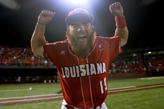 Louisiana-Lafayette's Jace Conrad celebrates after winning an NCAA college baseball tournament regional game against Mississippi State in Lafayette, La., Monday, June 2, 2014. Louisiana-Lafayette won 5-3. (AP Photo/Jonathan Bachman)