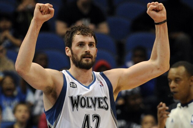 Minnesota Timberwolves forward Kevin Love (42) celebrates in an NBA basketball game against the San Antonio Spurs at the Target Center on in Minneapolis on Tuesday, April 8, 2014. (AP Photo/Hannah Foslien)