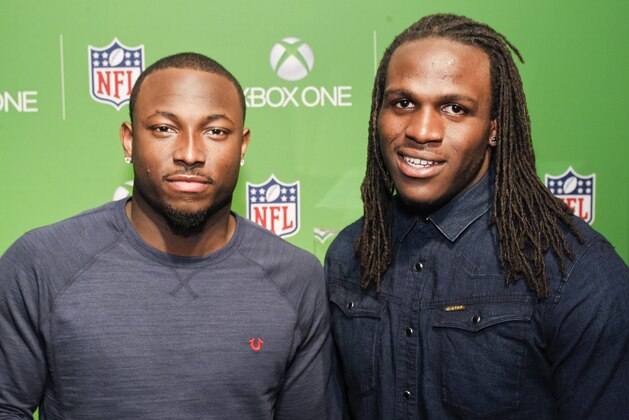 NFL player and running back for the Philadelphia Eagles LeSean McCoy and NFL player and running back for the Kansas City Chiefs Jamaal Charles are seen at the Xbox Loft Party on January 31, 2014 in, New York City. (Brian Ach/AP Images for NFL)