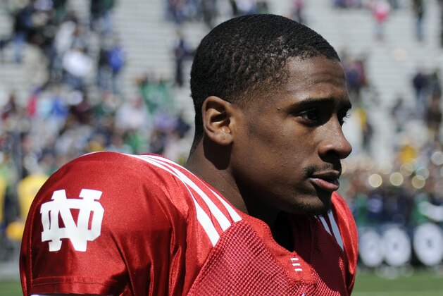 FILE - In this April 20, 2013, file photo, Notre Dame quarterback Everett Golson walks off the fieldduring the Blue-Gold spring scrimmage NCAA college football in South Bend, Ind. Golson says he was suspended from the university for the fall semester for using