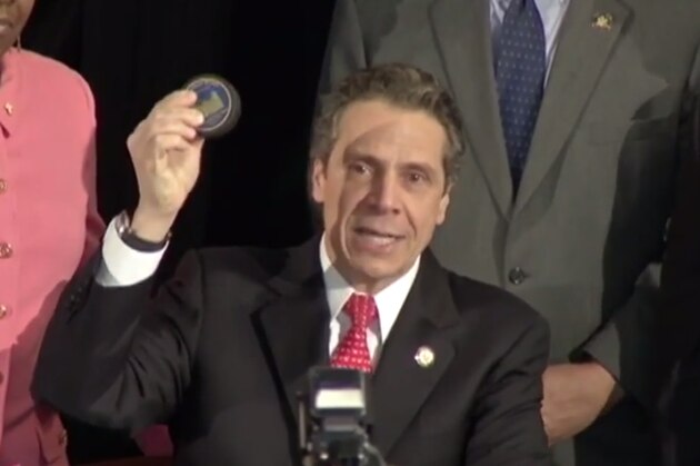 New York Gov. Andrew Cuomo speaks during the NY Rising Spring Conference on Wednesday, April 23, 2014, in Albany, N.Y. Gov. Cuomo and New York City Mayor Bill de Blasio are expected to announce property tax relief legislation for homeowners affected by Superstorm Sandy at the conference. (AP Photo/Mike Groll)