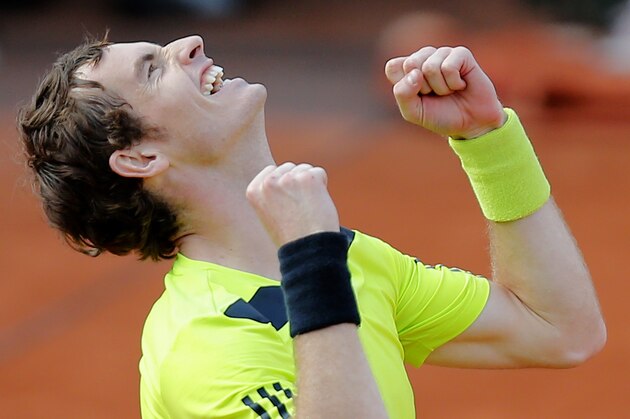 Britain's Andy Murray reacts after defeating Spain's Fernando Verdasco during their fourth round match of  the French Open tennis tournament at the Roland Garros stadium, in Paris, France, Monday, June 2, 2014. Murray won 6-4, 7-5, 7-6. (AP Photo/David Vincent)