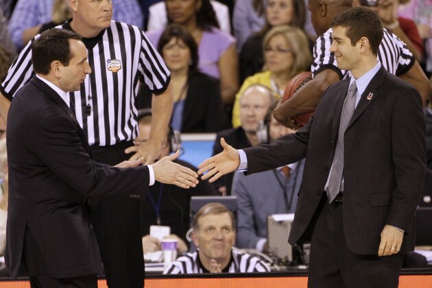 Duke head coach Mike Krzyzewski, left, greets Butler head coach Brad Stevens before the men's NCAA Final Four college basketball championship game Monday, April 5, 2010, in Indianapolis. (AP Photo/Amy Sancetta)