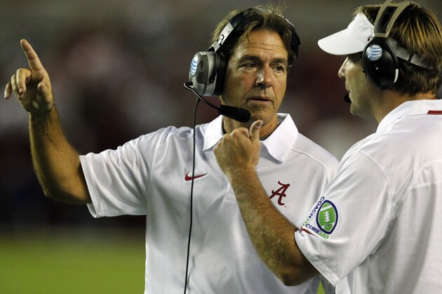 Alabama head coach Nick Saban talks with defensive coordinator Kirby Smart after a targeting call against one of Alabama's defenders during the second half of an NCAA college football game against Mississippi on Saturday, Sept. 28, 2013, in Tuscaloosa, Ala. (AP Photo/Butch Dill)