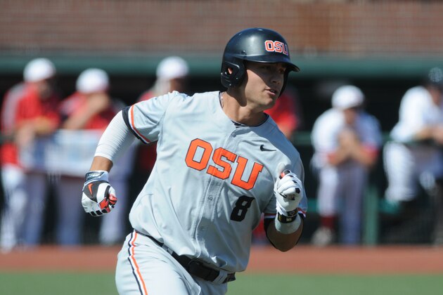 Oregon State's Michael Conforto (8) rounds first base on a hit against UNLV during an NCAA college baseball regional tournament game in Corvallis, Ore., Sunday, June 1, 2014. (AP Photo/Mark Ylen)