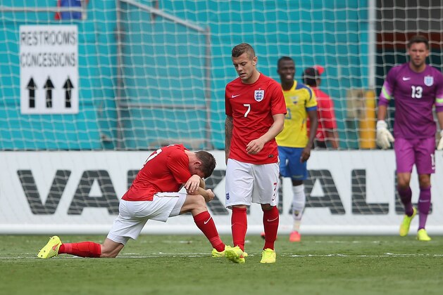MIAMI GARDENS, FL - JUNE 04:  James Milner and Jack Wilshire of England look dejected after conceeding the second goal during the International friendly match between England and Ecuador at Sun Life Stadium on June 4, 2014 in Miami Gardens, Florida.  (Photo by Richard Heathcote/Getty Images)