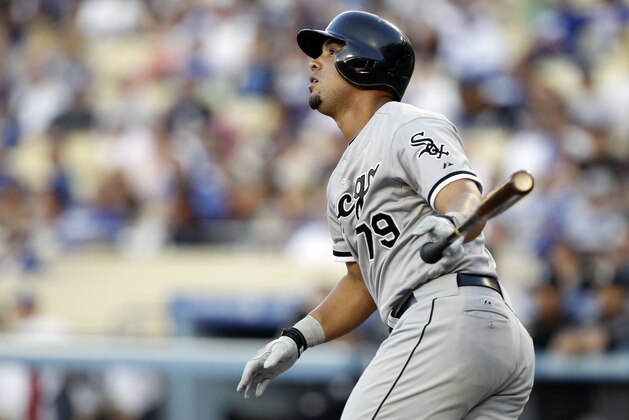 Chicago White Sox’ Jose Abreu hits a two-run home run against the Los Angeles Dodgers in the first inning of a baseball game on Tuesday, June 3, 2014 in Los Angeles. (AP Photo/Alex Gallardo)