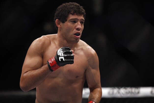 Oct 19, 2013; Houston, TX, USA; Gilbert Melendez fights against Diego Sanchez (not pictured) in their lightweight bout during UFC 166 at Toyota Center. Mandatory Credit: Andrew Richardson-USA TODAY Sports
