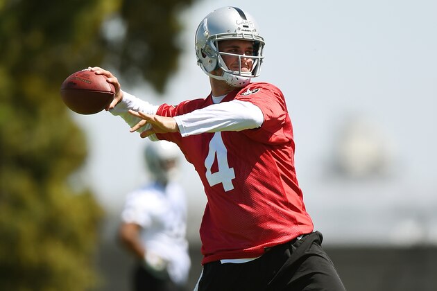 ALAMEDA, CA - MAY 16: Derek Carr #4 of the Oakland Raiders participates in drills during Rookie Minicamp on May 16, 2014 in Alameda, California. (Photo by Thearon W. Henderson/Getty Images)