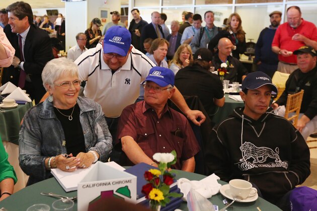 ELMONT, NY - JUNE 04:  Assistant Trainer of California Chrome Alan Sherman speaks to his Mother Faye and Father Art who is the head trainer as Jockey Victor Espinoza looks on during the Belmont stakes Draw at Belmont Park on June 4, 2014  in Elmont,  New York   California Chrome is scheduled to race for the Triple Crown in the 146th running of the Belmont Stakes  (Photo by Al Bello/Getty Images)