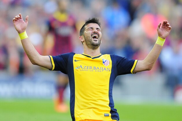 FILE - In this May 17, 2014 file photo, Atletico's David Villa celebrates at the end of a Spanish La Liga soccer match between FC Barcelona and Atletico Madrid at the Camp Nou stadium in Barcelona, Spain. Villa has signed a three-year contract with New York City FC, becoming the first player on the expansion Major League Soccer team that starts play next season. (AP Photo/Manu Fernandez, File) FILE - In this May 17, 2014 file photo, Atletico's David Villa celebrates at the end of a Spanish La Liga soccer match between FC Barcelona and Atletico Madrid at the Camp Nou stadium in Barcelona, Spain. Villa has signed a three-year contract with New York City FC, becoming the first player on the expansion Major League Soccer team that starts play next season. (AP Photo/Manu Fernandez, File)