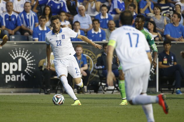 Greece's Andreas Samaris in action during an international friendly soccer match against Nigeria, Tuesday, June 3, 2014, in Chester, Pa. (AP Photo/Matt Slocum)