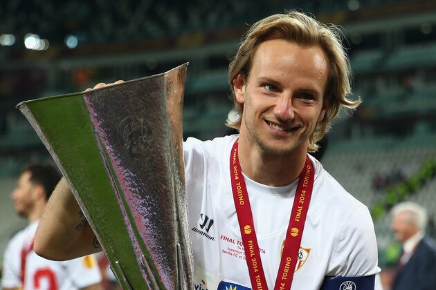 TURIN, ITALY - MAY 14:  Ivan Rakitic of Sevilla poses with the trophy during the UEFA Europa League Final match between Sevilla FC and SL Benfica at Juventus Stadium on May 14, 2014 in Turin, Italy.  (Photo by Michael Steele/Getty Images)