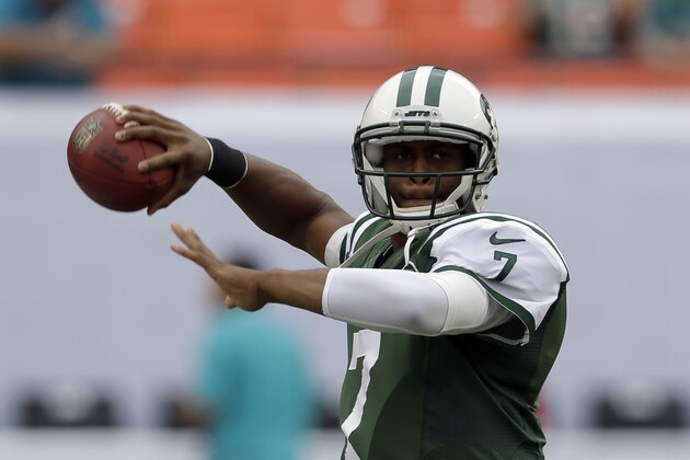 New York Jets quarterback Geno Smith (7) prepares to pass during pregame practice of a NFL football game against the Miami Dolphins in Miami Gardens, Fla., Sunday, Dec. 29, 2013. (AP Photo/Alan Diaz)