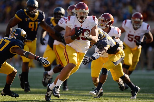 BERKELEY, CA - NOVEMBER 09:  Ty Isaac #29 of the USC Trojans carries the ball against the California Golden Bears during the third quarter at California Memorial Stadium on November 9, 2013 in Berkeley, California. The Trojans won the game 62-28. (Photo by Thearon W. Henderson/Getty Images)