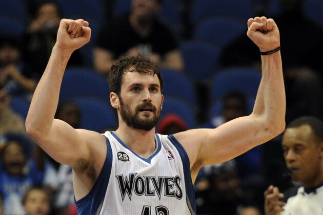 Minnesota Timberwolves forward Kevin Love (42) celebrates in an NBA basketball game against the San Antonio Spurs at the Target Center on in Minneapolis on Tuesday, April 8, 2014. (AP Photo/Hannah Foslien)