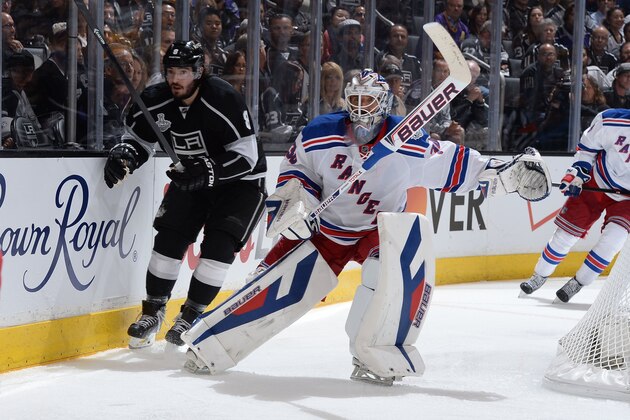 LOS ANGELES, CA - JUNE 4:  Henrik Lundqvist #30 of the New York Rangers looks on against Drew Doughty #8 of the Los Angeles Kings in Game One of the 2014 NHL Stanley Cup Final at Staples Center on June 4, 2014 in Los Angeles, California. (Photo by Andrew D. Bernstein/NHLI via Getty Images)