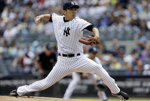 New York Yankees' Masahiro Tanaka, of Japan, delivers a pitch during the first inning of a baseball game against the Minnesota Twins Saturday, May 31, 2014, in New York.  (AP Photo/Frank Franklin II)