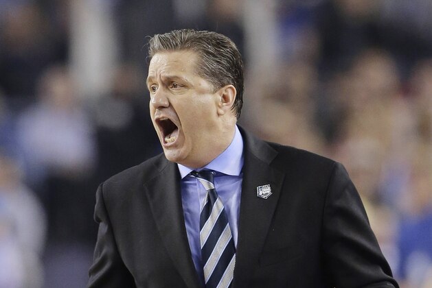 Kentucky head coach John Calipari works the sideline against Connecticut during the second half of the NCAA Final Four tournament college basketball championship game Monday, April 7, 2014, in Arlington, Texas. (AP Photo/Eric Gay)