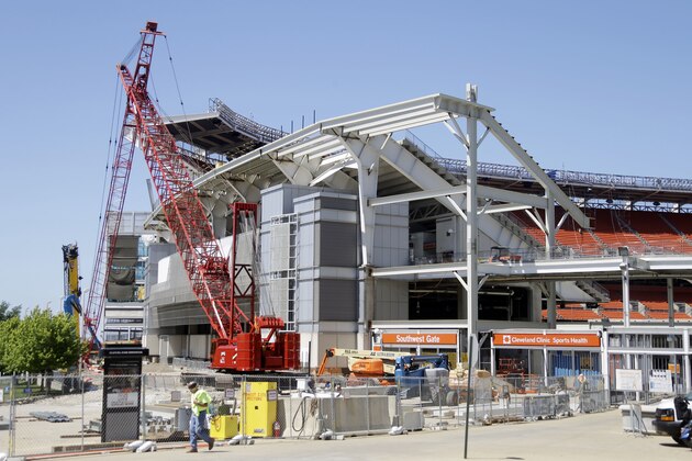 A workman leaves the job site at FirstEnergy Stadium in Cleveland where renovation of the 15-year-old home of the Cleveland Browns continues Thursday, June 5, 2014. Cuyahoga County Executive Ed FitzGerald has suggested divvying up maintenance money from the county's