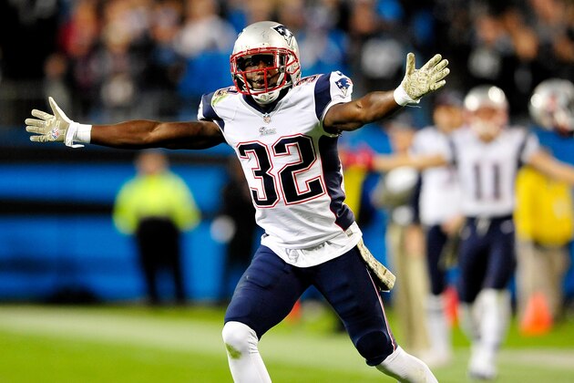 CHARLOTTE, NC - NOVEMBER 18:  Devin McCourty #32 of the New England Patriots reacts after being called for defensive holding late in the fourth qurter of a loss to the Carolina Panthers at Bank of America Stadium on November 18, 2013 in Charlotte, North Carolina. The Panthers won 24-20.  (Photo by Grant Halverson/Getty Images)