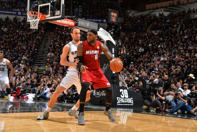 SAN ANTONIO, TX - JUNE 5: LeBron James #6 of the Miami Heat backs up to the basket against the San Antonio Spurs during Game One of the 2014 NBA Finals on June 5, 2014 at AT&T Center in San Antonio, Texas. NOTE TO USER: User expressly acknowledges and agrees that, by downloading and or using this photograph, User is consenting to the terms and conditions of the Getty Images License Agreement. Mandatory Copyright Notice: Copyright 2014 NBAE (Photo by Jesse D. Garrabrant/NBAE via Getty Images)