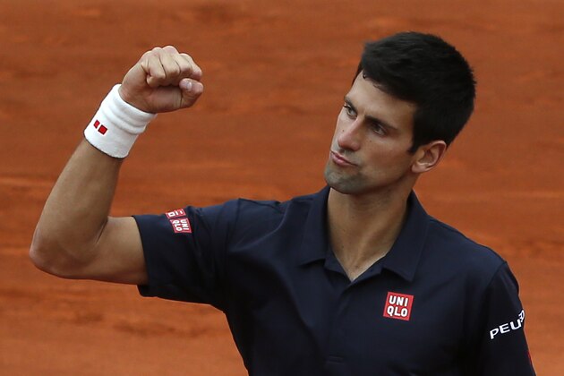 Serbia's Novak Djokovic clenches his fist as he wins the second set against Canada's Milos Raonic during their quarterfinal match of the French Open tennis tournament at the Roland Garros stadium, in Paris, France, Tuesday, June 3, 2014. (AP Photo/Michel Euler) Serbia's Novak Djokovic clenches his fist as he wins the second set against Canada's Milos Raonic during their quarterfinal match of the French Open tennis tournament at the Roland Garros stadium, in Paris, France, Tuesday, June 3, 2014. (AP Photo/Michel Euler)
