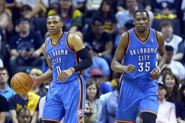 MEMPHIS, TN - APRIL 26:  Russell Westbrook #0 of the Oklahoma City Thunder and Kevin Durant #35 come up the floor together during the game against the Memphis Grizzlies in Game 4 of the Western Conference Quarterfinals during the 2014 NBA Playoffs at FedExForum on April 26, 2014 in Memphis, Tennessee. NOTE TO USER: User expressly acknowledges and agrees that, by downloading and or using this photograph, User is consenting to the terms and conditions of the Getty Images License Agreement.  (Photo by Andy Lyons/Getty Images)