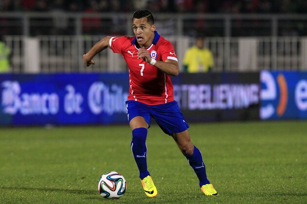 Chile's Alexis Sanchez, goes for a ball during an international friendly soccer match against against Northern Ireland, in Valparaiso, Chile, Wednesday, June 4, 2014. (AP Photo/Luis Hidalgo) Chile's Alexis Sanchez, goes for a ball during an international friendly soccer match against against Northern Ireland, in Valparaiso, Chile, Wednesday, June 4, 2014. (AP Photo/Luis Hidalgo)