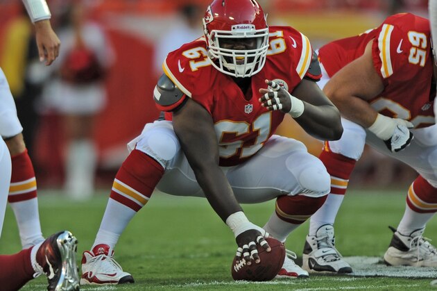 KANSAS CITY, MO - AUGUST 10:  Center Rodney Hudson #61 of the Kansas City Chiefs gets set at the line against the Arizona Cardinals during the first half on August 10, 2012 at Arrowhead Stadium in Kansas City, Missouri.  (Photo by Peter Aiken/Getty Images)