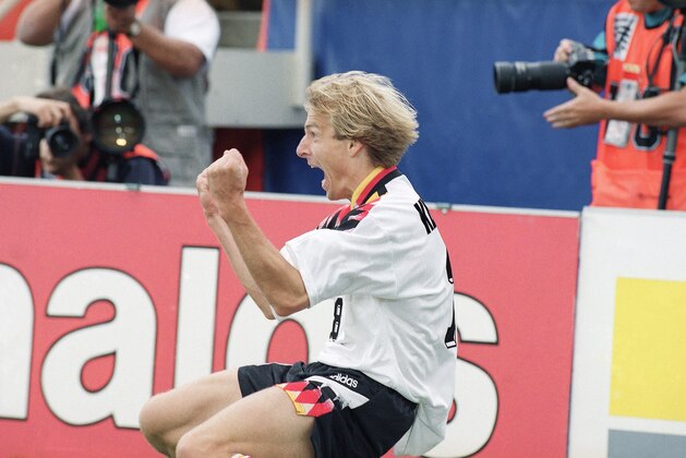 Germany's Jurgen Klinsmann celebrates after scoring his team's second goal over Belgium during their second round World Cup soccer game at Soldier Field, Saturday, July 2, 1994 in Chicago, Ill. (AP Photo/Denis Paquin) Germany's Jurgen Klinsmann celebrates after scoring his team's second goal over Belgium during their second round World Cup soccer game at Soldier Field, Saturday, July 2, 1994 in Chicago, Ill. (AP Photo/Denis Paquin)