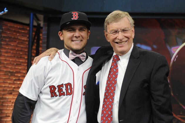 Baseball Commissioner Bud Selig, right, poses with shortstop Michael Chavis from Sprayberry Senior High School in Marietta, Ga., at the 2014 MLB baseball draft Thursday, June 5, 2014, in Secaucus, N.J. Chavis was selected by the Boston Red Sox with the 26th pick in the first round. (AP Photo/Bill Kostroun)