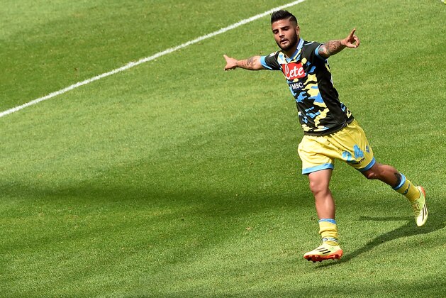GENOA, ITALY - MAY 11:  Lorenzo Insigne of Napoli celebrates after scoring his team's second goal during the Serie A match between UC Sampdoria and SSC Napoli at Stadio Luigi Ferraris on May 11, 2014 in Genoa, Italy.  (Photo by Tullio M. Puglia/Getty Images)