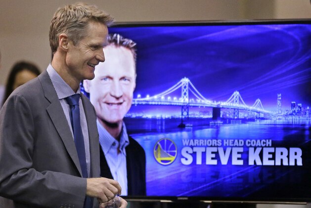 Golden State Warriors coach Steve Kerr arrives for a news conference Tuesday, May 20, 2014, in Oakland, Calif.  Kerr plans to finish his duties broadcasting the Western Conference finals for TNT before starting with the Warriors.(AP Photo/Ben Margot)